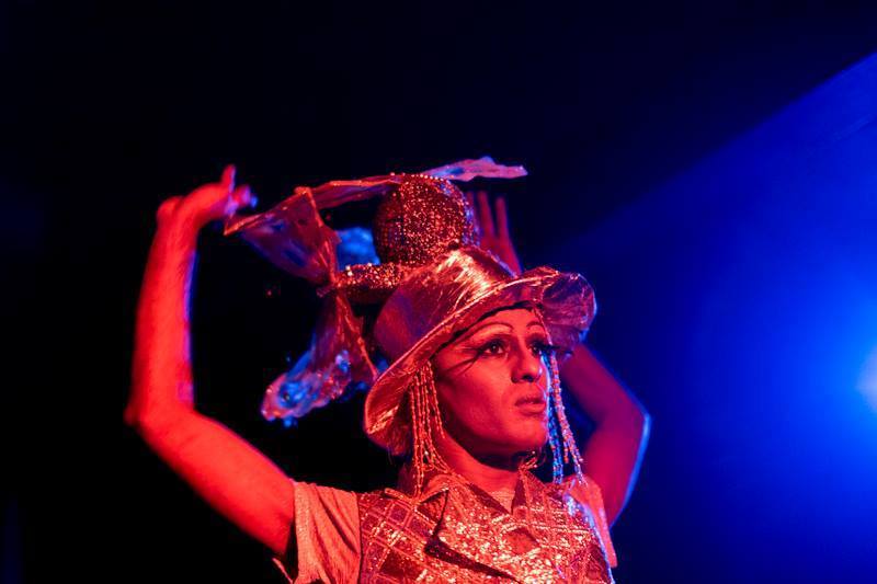 Photograph of Kama La Mackerel doing her performance during the residency