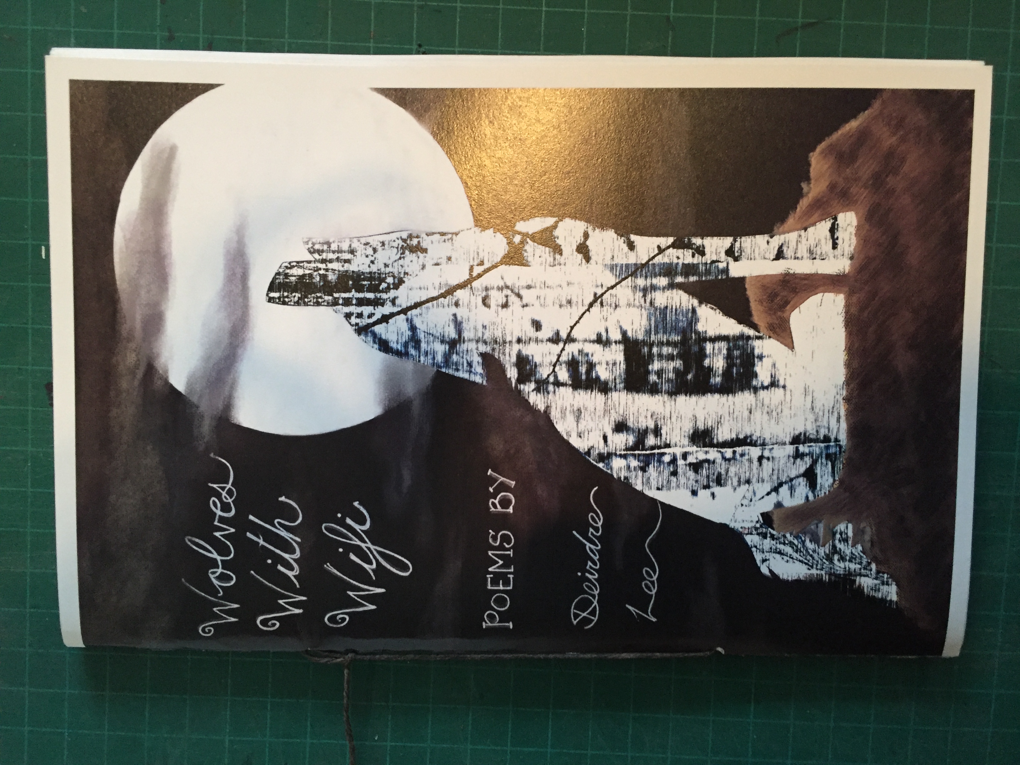 the words 'wolves with wifi; poems by Deidre Lee' and a drawing of a wolf howling under a full moon
