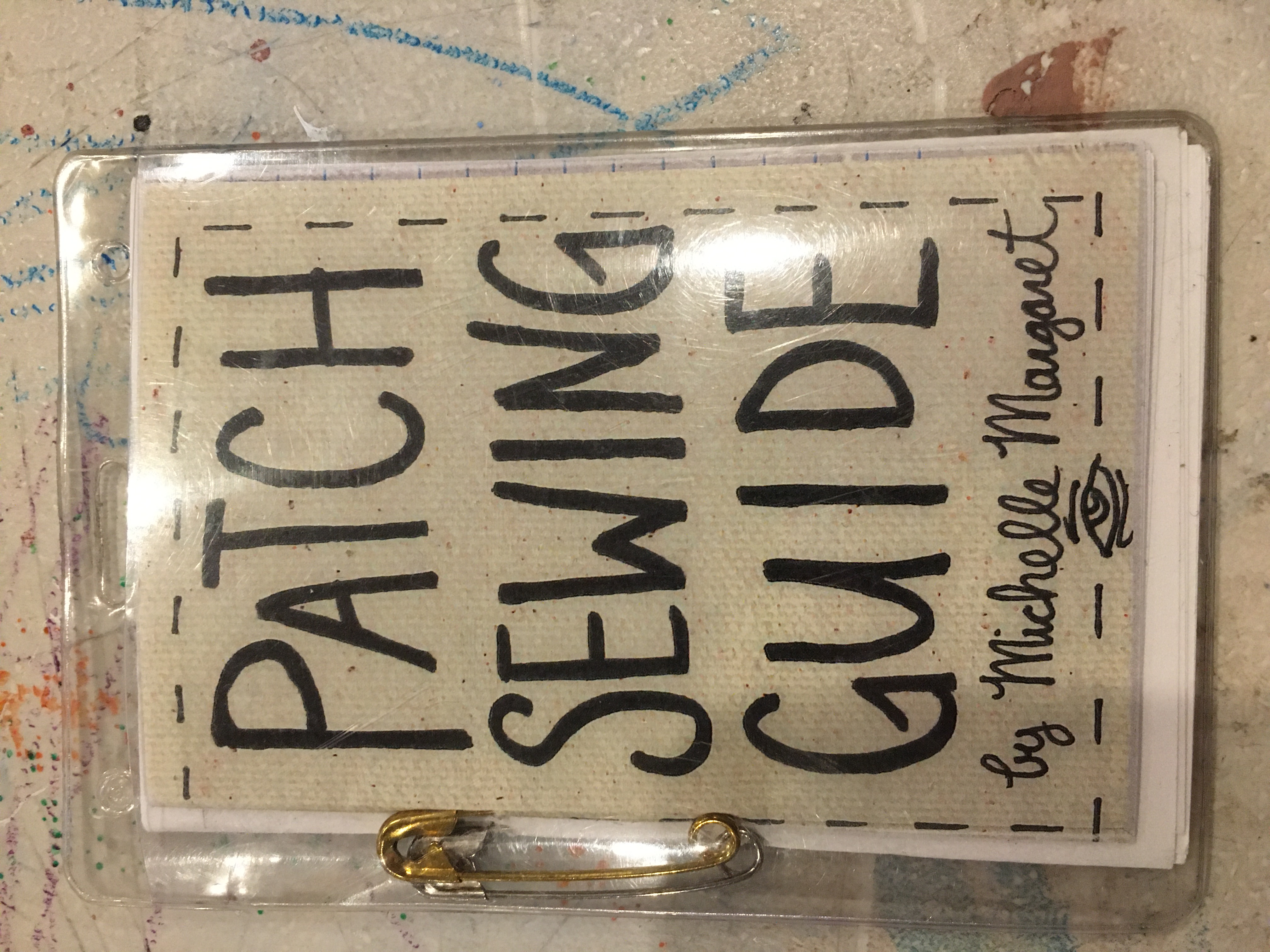 Text reads "Patch Sewing Guide by Michelle Margaret" with an eye illustration at the bottom.