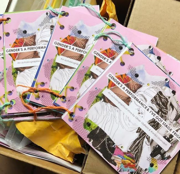 A collaged background of colourful images, black tulle, and sequins with a black and white illustration of the author, left half in masculine day clothes, and right half in feminine drag
