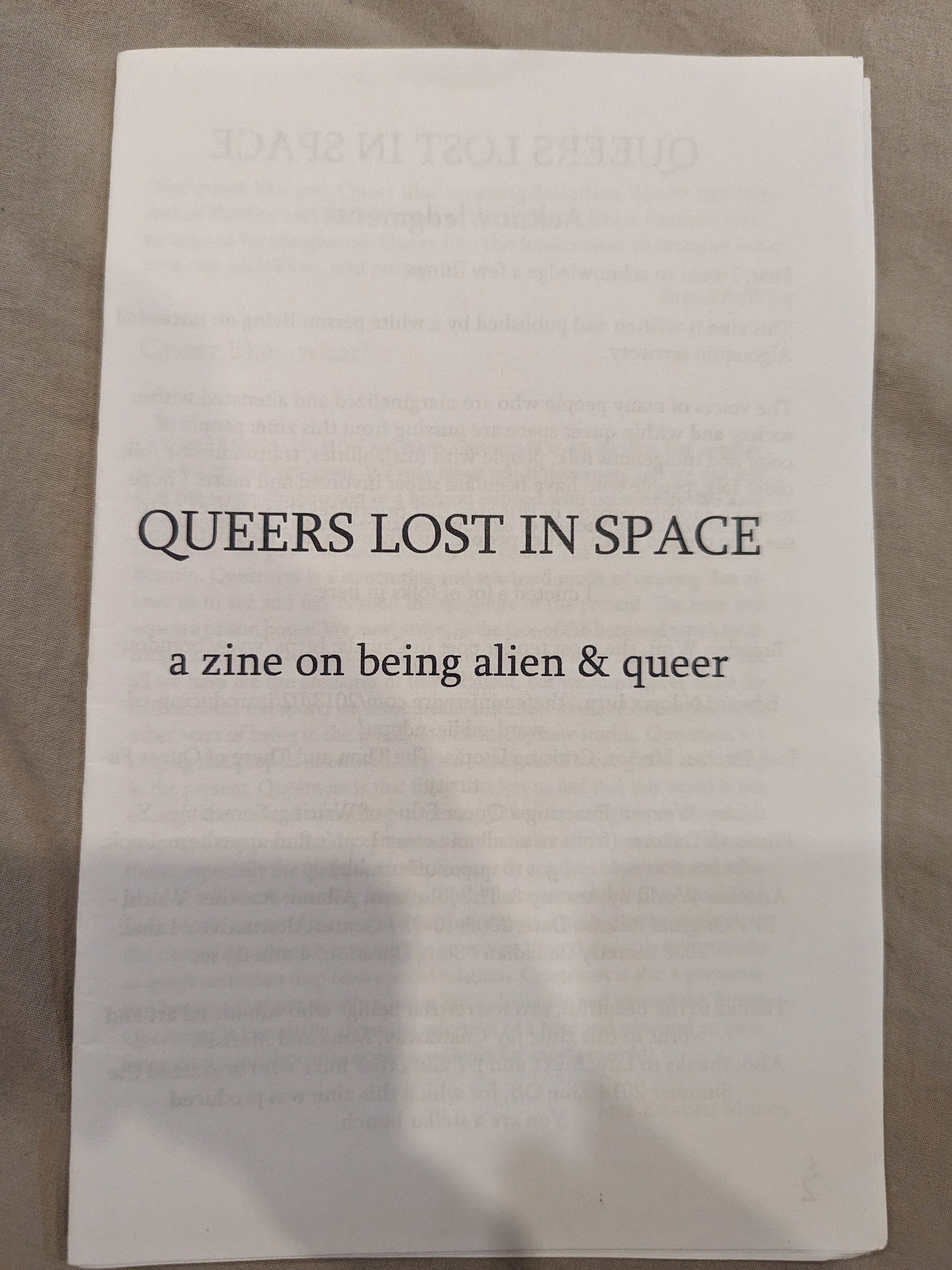 Underneath the title it says, "A zine on being alien and queer"