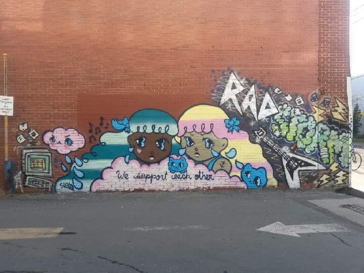 A photograph of the mural on the RadStorm building